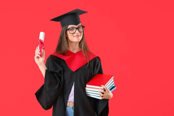 Vrouwelijke Afgestudeerde Student Met Diploma Boeken Kleur Achtergrond — Stockfoto