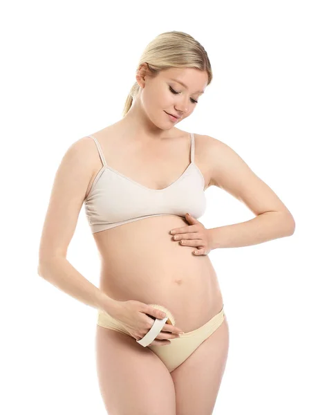 Vacker Gravid Ung Kvinna Med Massage Borste Vit Bakgrund — Stockfoto