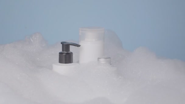 Set Cosmetics Bath Foam Blue Background — Stock Video