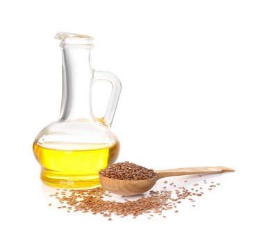 Beyaz arkaplanda keten yağı ve tohumlu süspansiyon