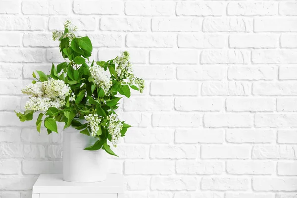 Vase Lilac Flowers Table Brick Wall — Stock Photo, Image