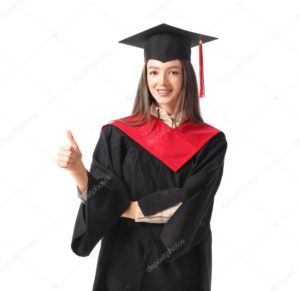 Female graduating student showing thumb-up gesture on white background