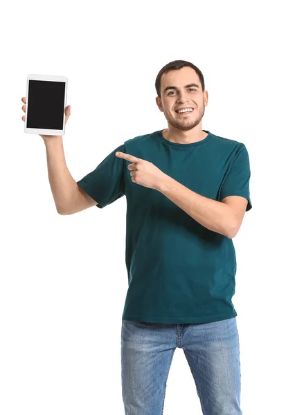 Jovem Apontando Para Tablet Fundo Branco — Fotografia de Stock