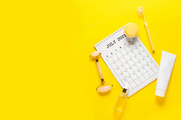 Calendario Accessori Cosmetici Sfondo Colori — Foto Stock