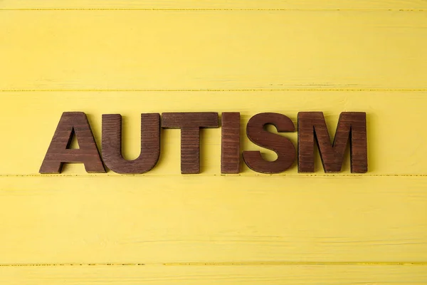 Word Autism Color Wooden Background Stock Picture