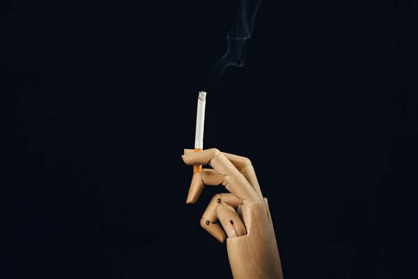 Mão Madeira Com Cigarro Fundo Escuro Conceito Dependência — Fotografia de Stock