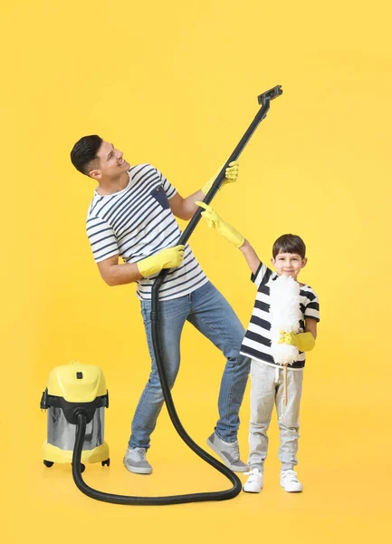 Father Son Vacuum Cleaner Color Background — Stock Photo, Image