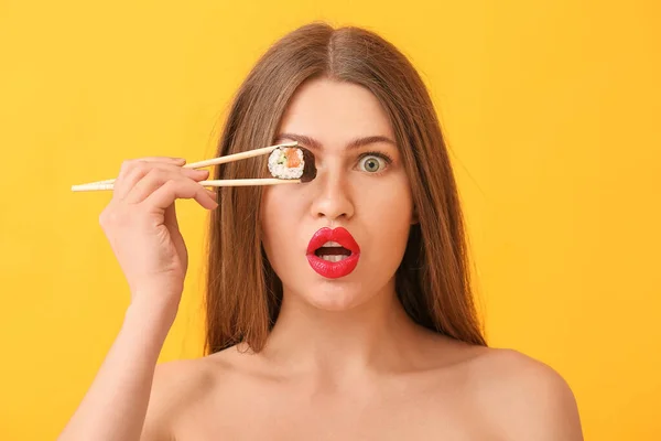 Surprised Young Woman Tasty Sushi Roll Color Background — Stock Photo, Image