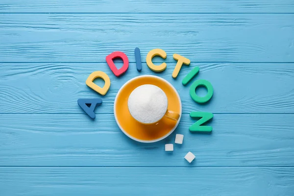Word Addiction Cup Sugar Color Wooden Background — Stock Photo, Image