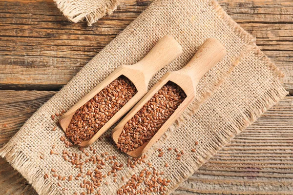 Composition Scoops Flax Seeds Wooden Table — Stock Photo, Image