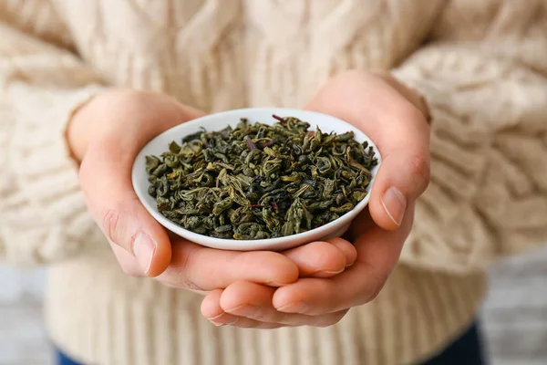 Woman Holding Bowl Dry Green Tea Leaves Closeup — Stock Photo, Image