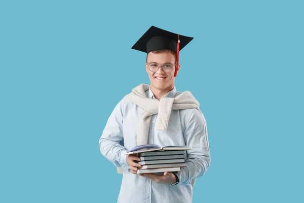 Man Afstuderen Student Met Boeken Kleur Achtergrond — Stockfoto