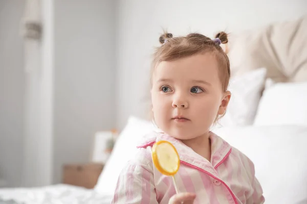 Cute Little Girl Lollipop Bedroom Closeup — Stock Fotó