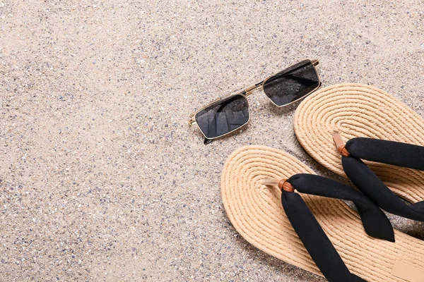 Stylish Sunglasses Flip Flops Sand — Stock Photo, Image