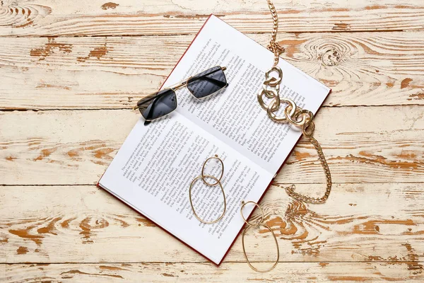 Stylish Sunglasses Book Jewelry White Wooden Background — Stock Photo, Image