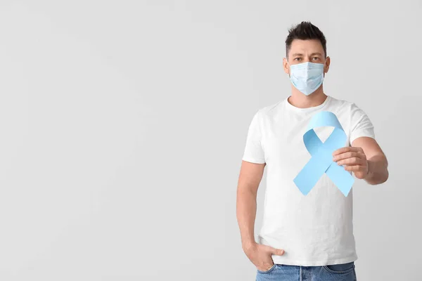 Man Blue Ribbon Light Background Prostate Cancer Awareness Concept — Stock Photo, Image