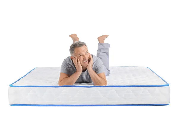 Mature Man Lying Soft Mattress White Background — Stock Photo, Image