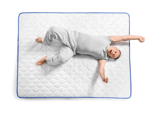 Happy Mature Man Lying Soft Mattress White Background — Stock Photo, Image