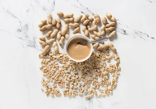 Bowl Tasty Peanut Butter Nuts White Background — Stock Photo, Image