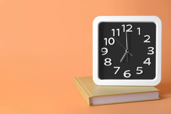 Stylish Clock Notebook Color Background — Stock Photo, Image