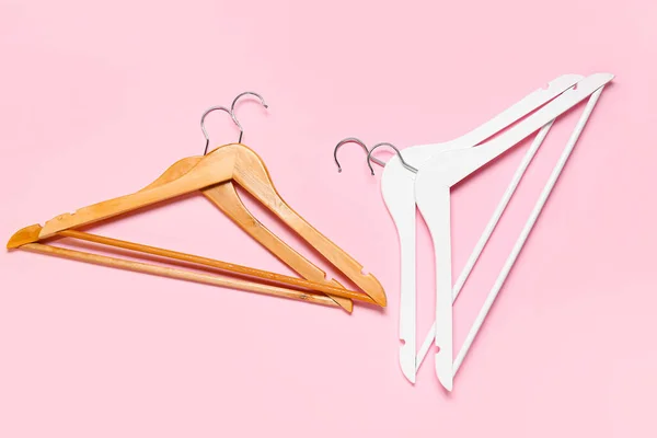 Stylish Clothes Hangers Color Background — Stock Photo, Image