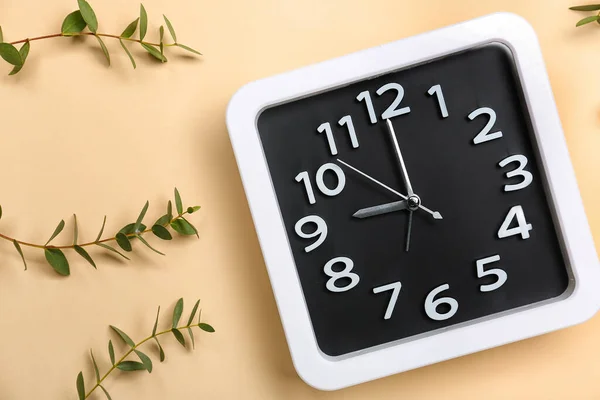 Stylish Clock Green Branches Color Background — Stock Photo, Image