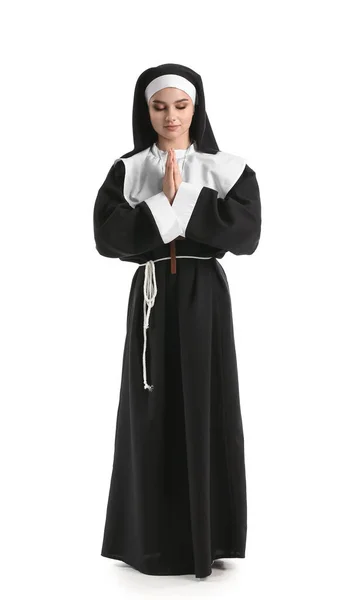 白人背景的年轻祈祷修女 — 图库照片