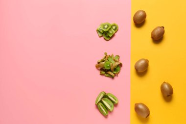 Renk arkaplanında olgun kivi içeren kompozisyon