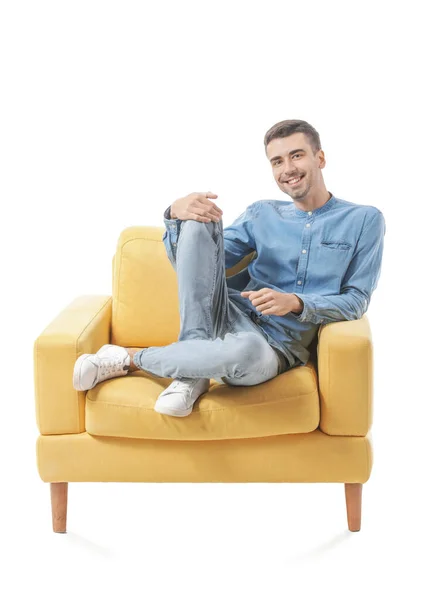 Mladý Muž Sedí Křesle Bílém Pozadí — Stock fotografie
