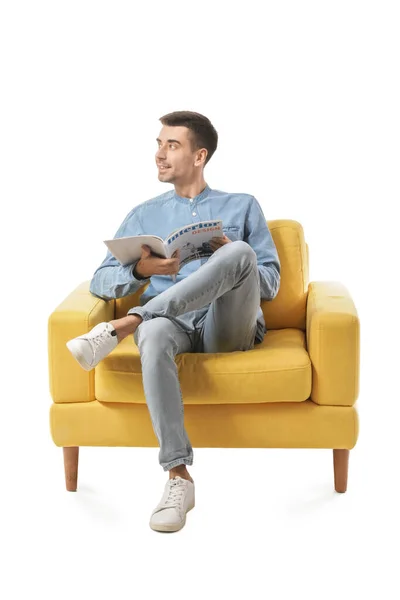 Jongeman Met Tijdschrift Zittend Fauteuil Witte Achtergrond — Stockfoto