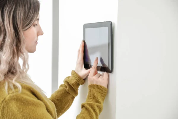 Woman Using Smart Home Security System Control Panel — Stock Photo, Image