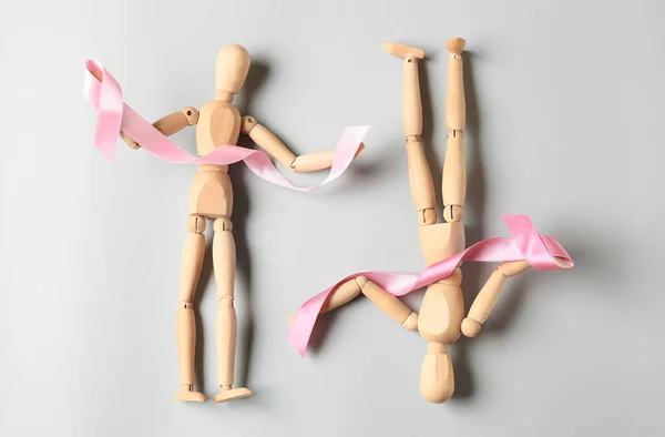 Wooden Mannequins Pink Ribbons Grey Background Breast Cancer Concept — Stock Photo, Image