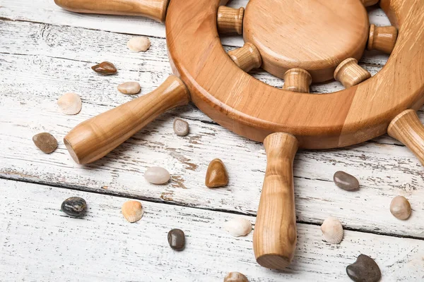 Helm Pebbles Wooden Background — Stock Photo, Image