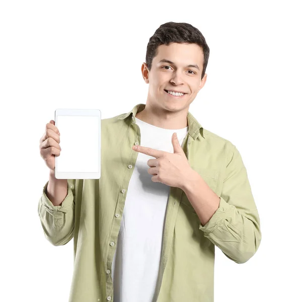 Hombre Joven Guapo Apuntando Tableta Sobre Fondo Blanco —  Fotos de Stock