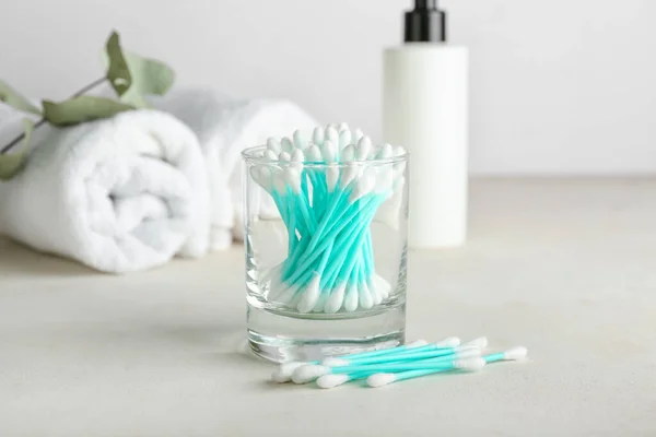 Glass Cotton Swabs Bottle Cosmetic Product Towels Light Background — Stock Photo, Image