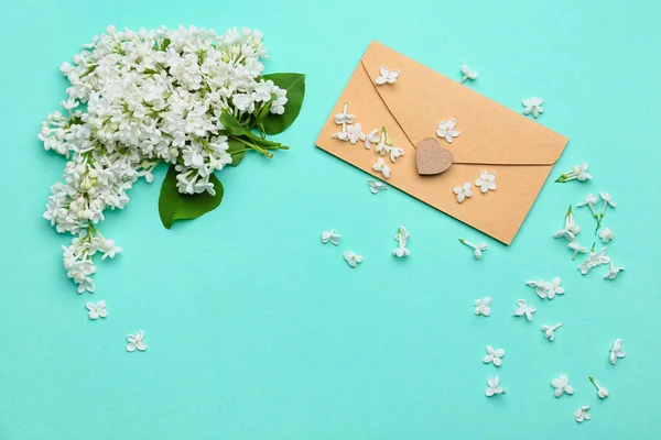 Envelope Beautiful Lilac Flowers Color Background — Stock Photo, Image