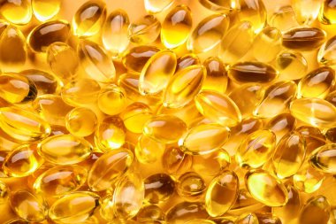 Arkaplan olarak balık yağı kapsülleri
