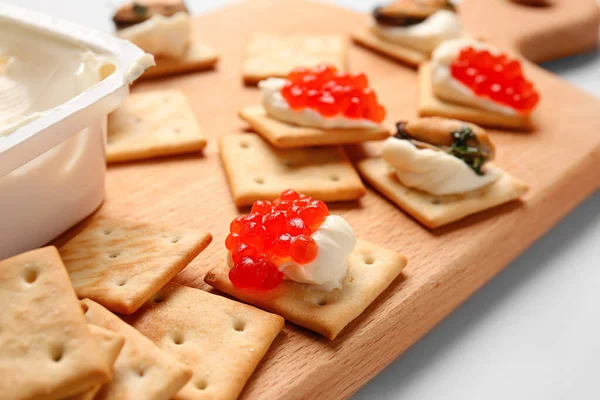 Tasty Crackers Cheese Red Caviar Mussels Wooden Board Closeup — Stock Photo, Image