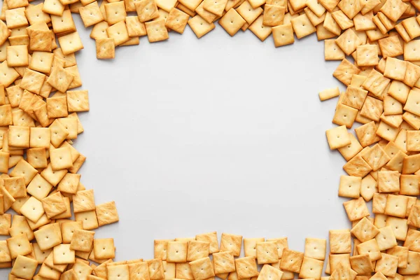Frame Made Tasty Crackers Grey Background — Stock Photo, Image
