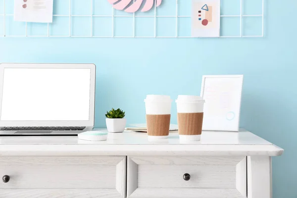 Stylish Workplace Takeaway Cups Coffee Color Wall — Stock Photo, Image