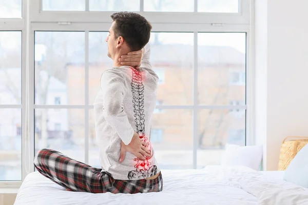 Young Man Suffering Back Pain Bedroom — Stock Photo, Image