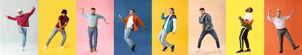 Stiliga Män Dansar Mot Färg Bakgrund — Stockfoto