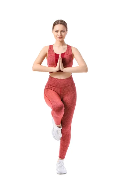 Mujer Joven Deportiva Haciendo Yoga Sobre Fondo Blanco —  Fotos de Stock