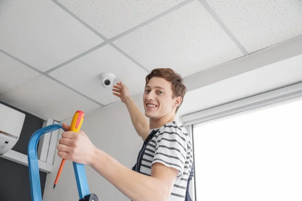 Worker Installing Alarm System Indoors — Stock Photo, Image