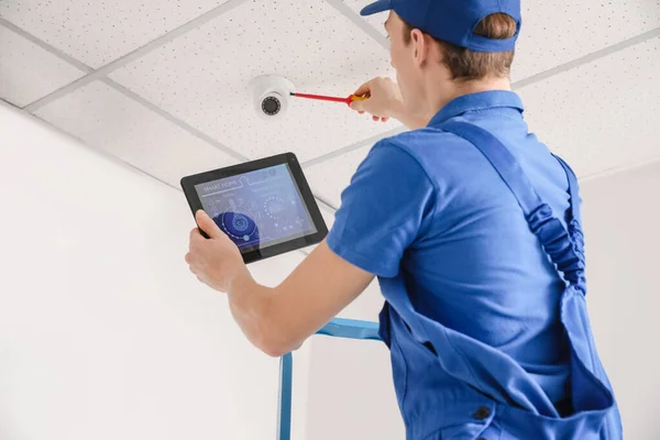 Worker Installing Alarm System Indoors — Stock Photo, Image
