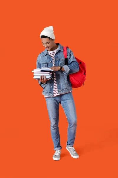 Mężczyzna Afroamerykanin Student Książki Tle Koloru — Zdjęcie stockowe