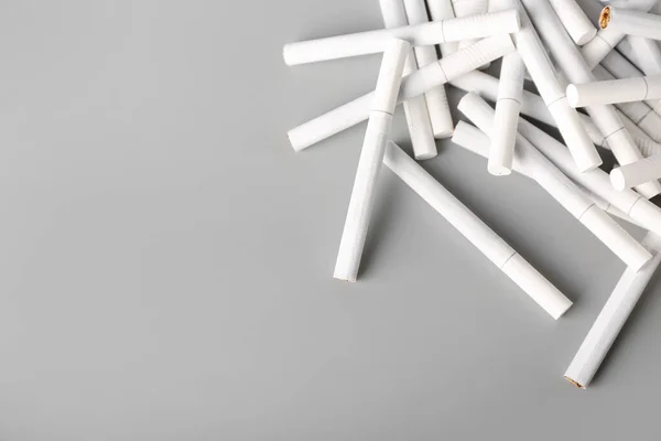 Many Cigarettes Grey Background — Stock Photo, Image