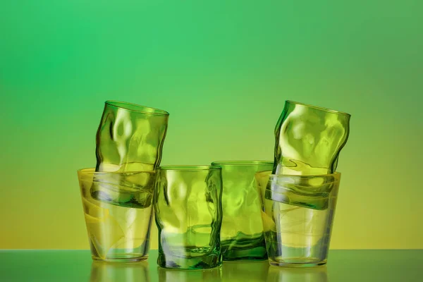 Beautiful Empty Glasses Color Background — Stock Photo, Image