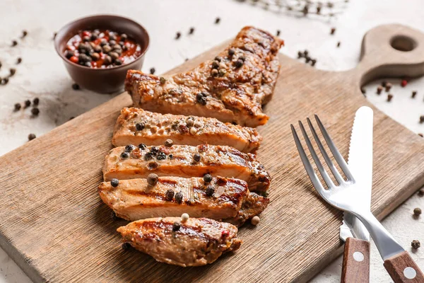 Board Tasty Roasted Meat Peppercorn Sauce Light Background Closeup — Stock Photo, Image