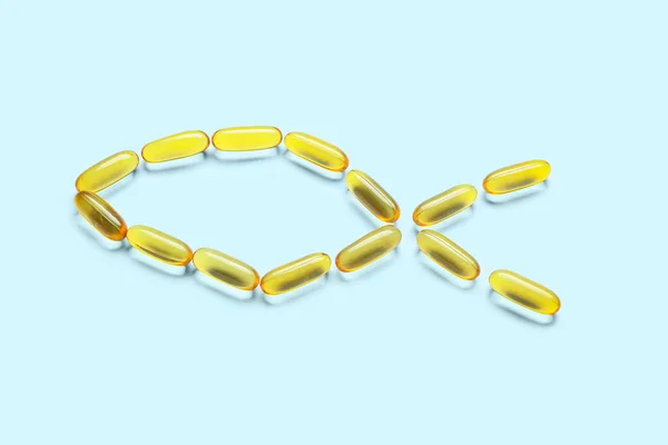 Fish Made Oil Capsules Color Background — ストック写真